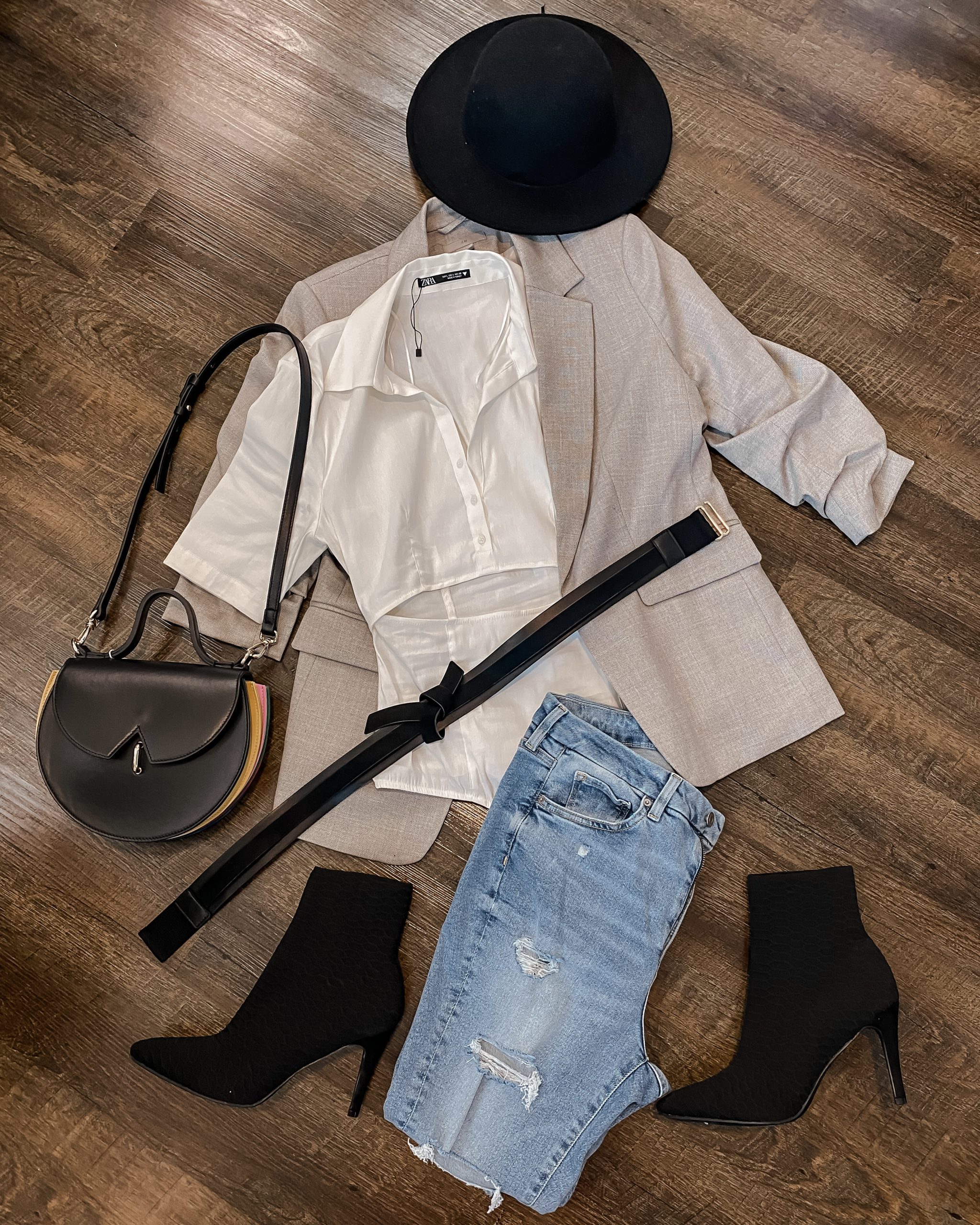 Flat lay of black and Grey Outfit